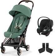 Коляска Cybex Coya Rosegold Frame Aton B2 i-Size Volcano Black Leaf Green с дождевиком и бампером